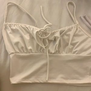 White crop top from Publik, was bought in boutique in New york. Size Small